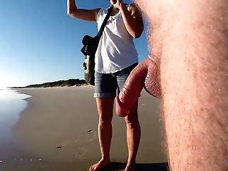 Nude Masculine Talk On A Clothed Beach